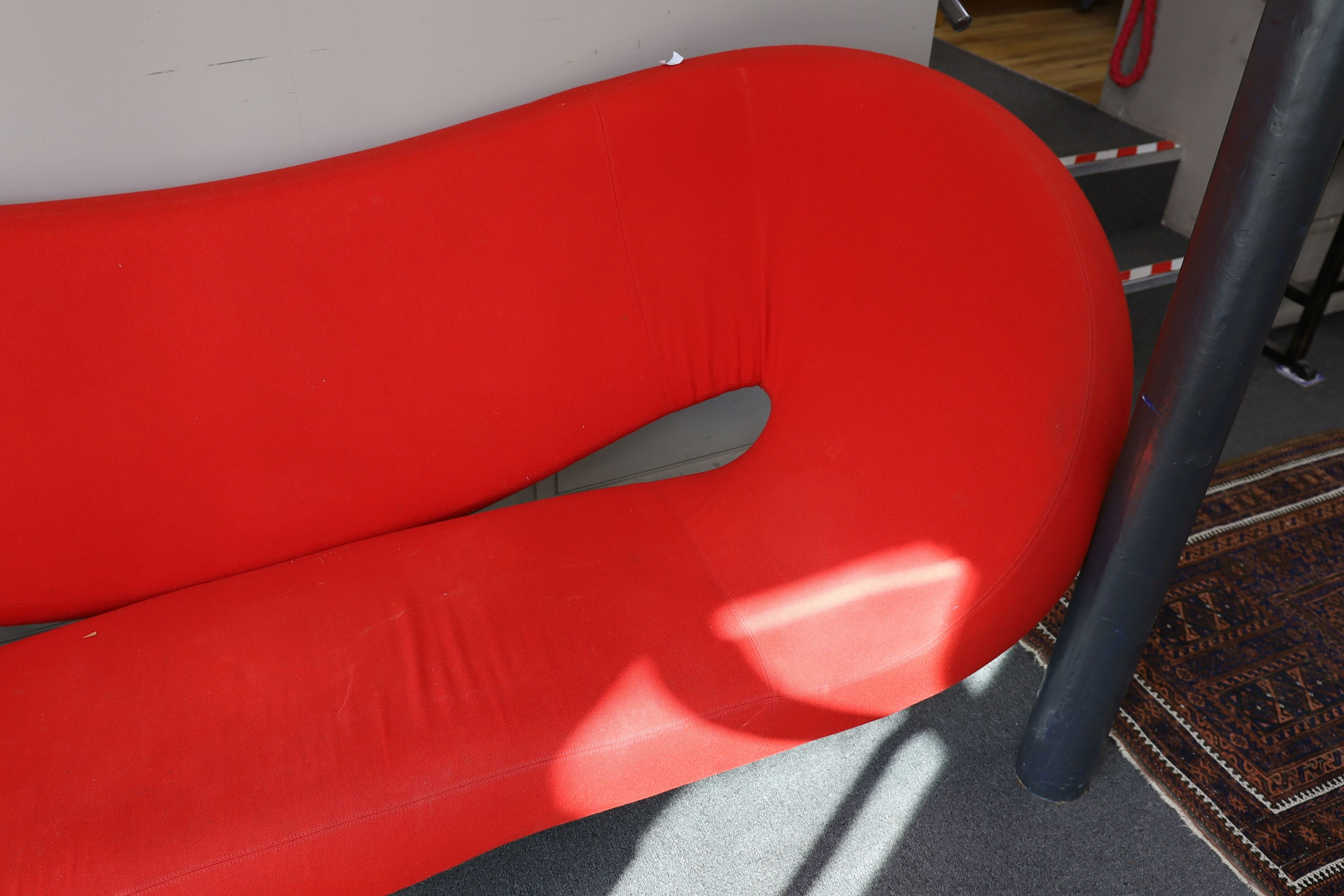 A Ron Arad, 'Moroso' sofa upholstered in red fabric, length 240cm, depth 94cm, height 100cm